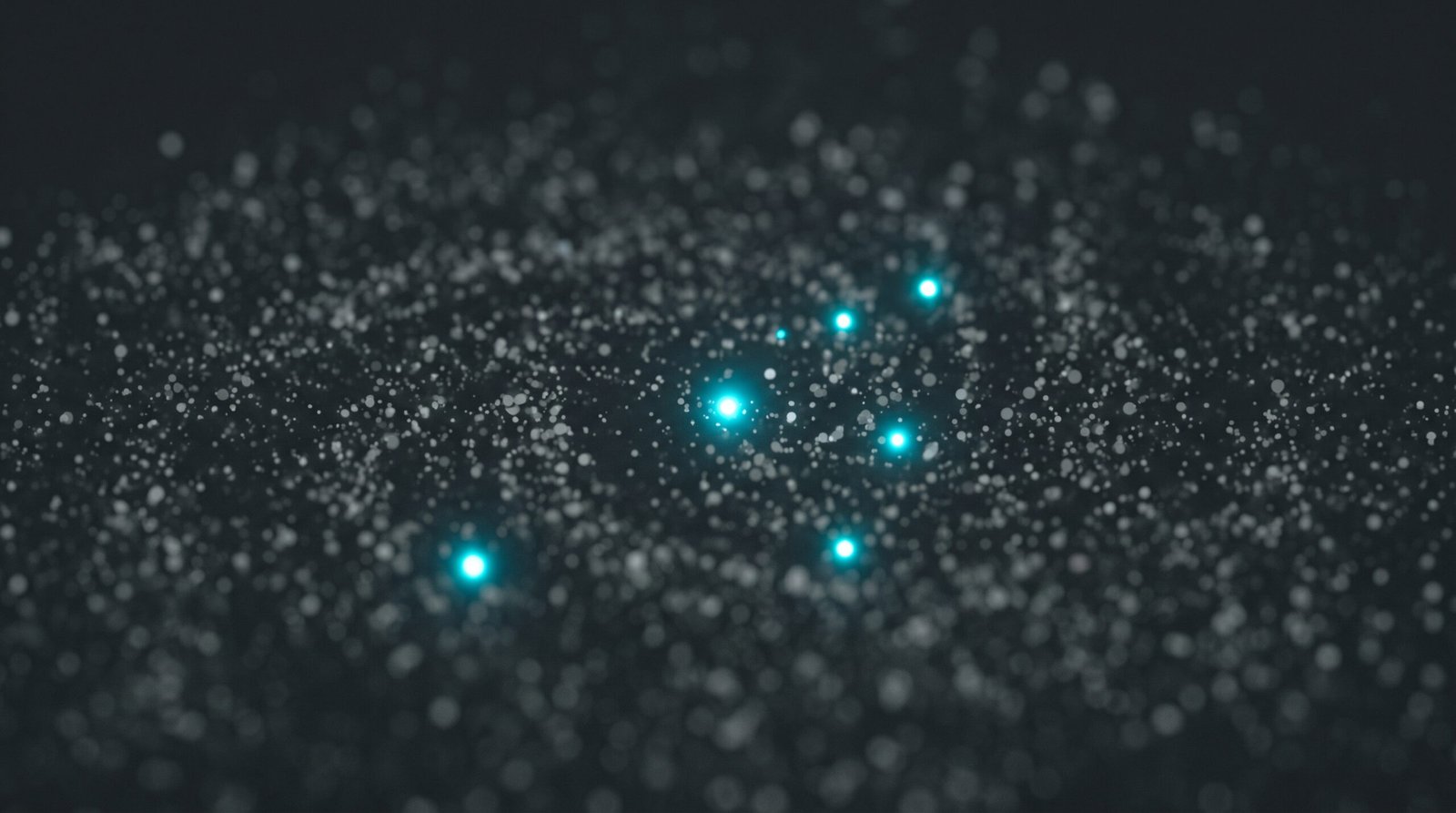 Abstract image of a few bright cyan dots standing out distinctly from a sea of dim grey dots, dark background.